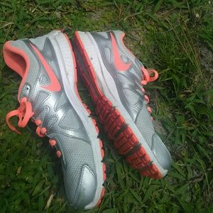 Gray and orange women Nike sneakers